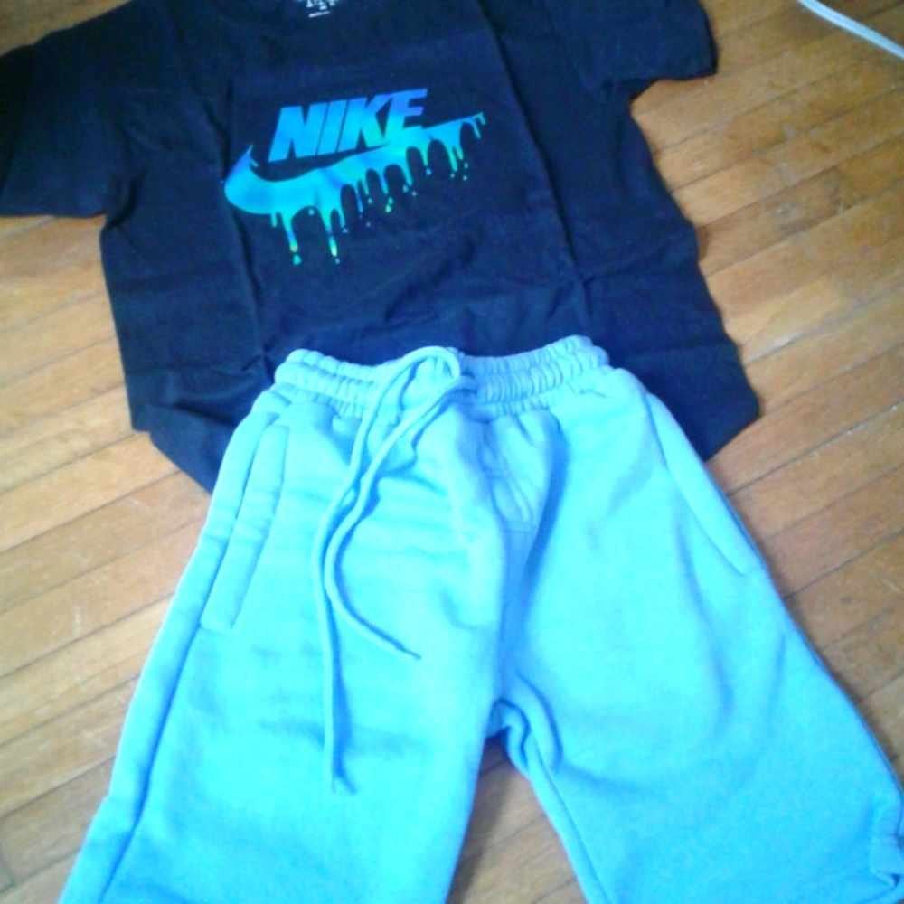 Boys customized Nike shirt and blue shorts